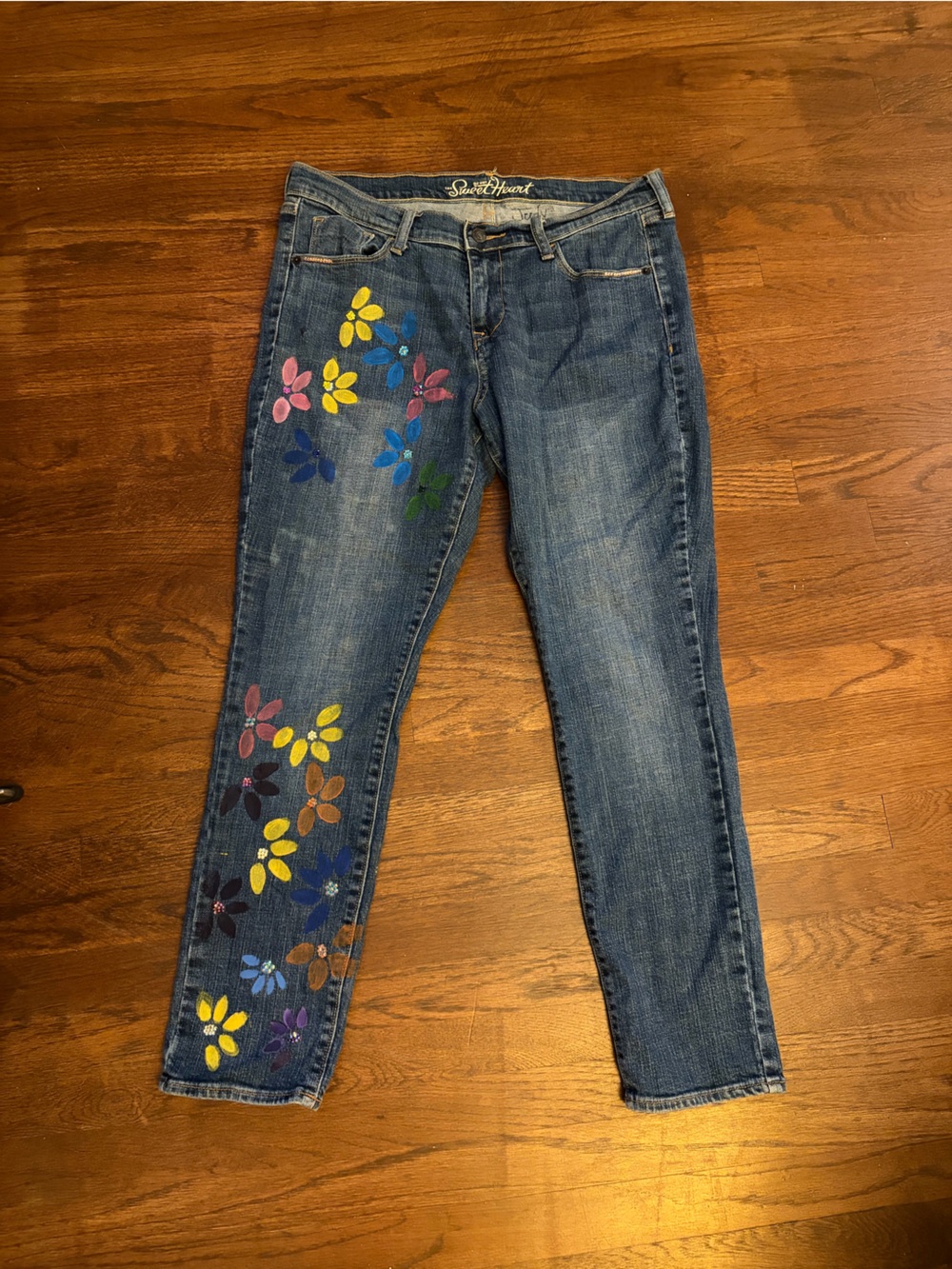 Blue Jeans with Multicolor  hand painted, blinged, and bleached designs